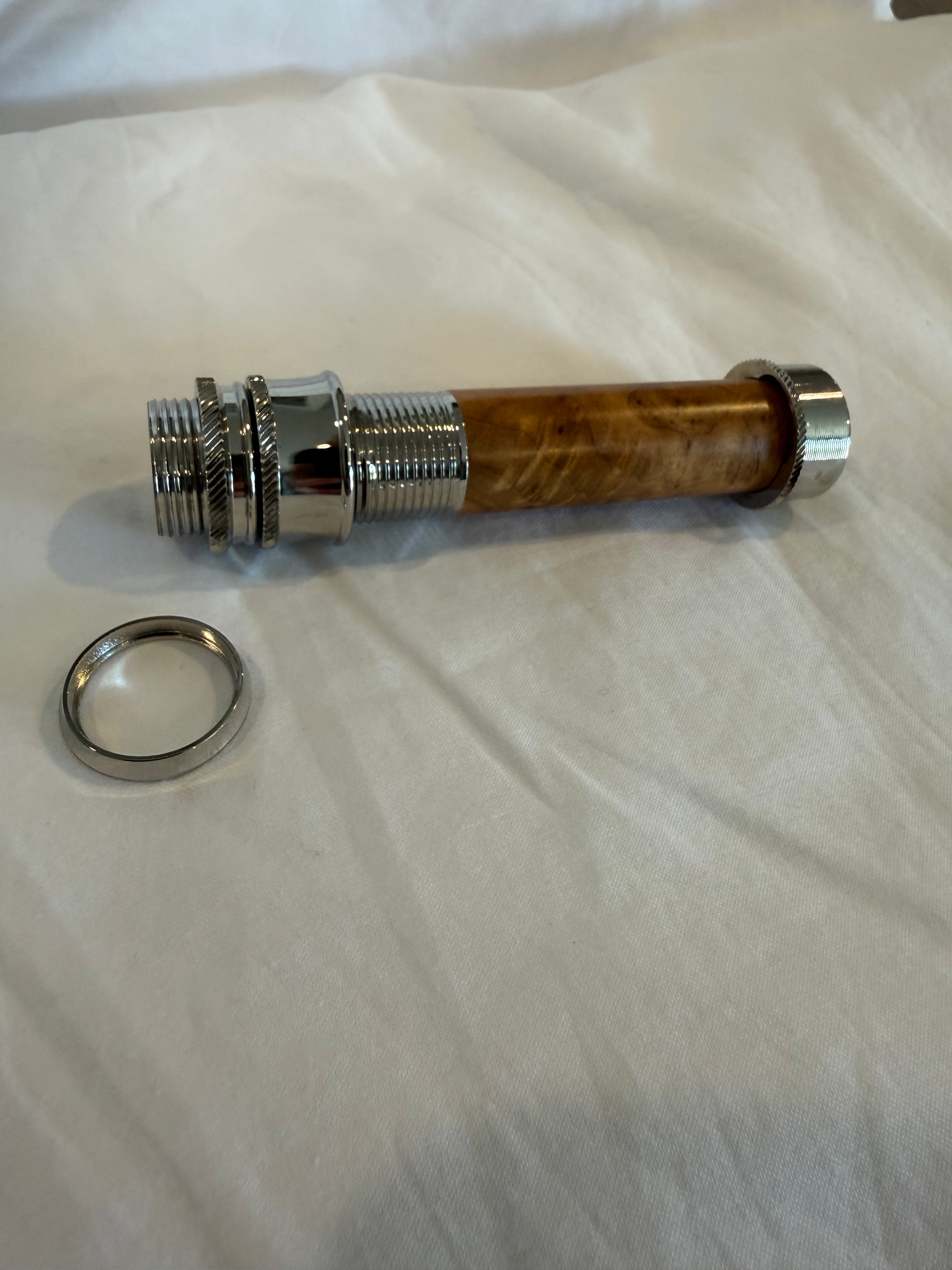 Aluminum uplocking fly reel seat in bright nickel with a light Burl insert