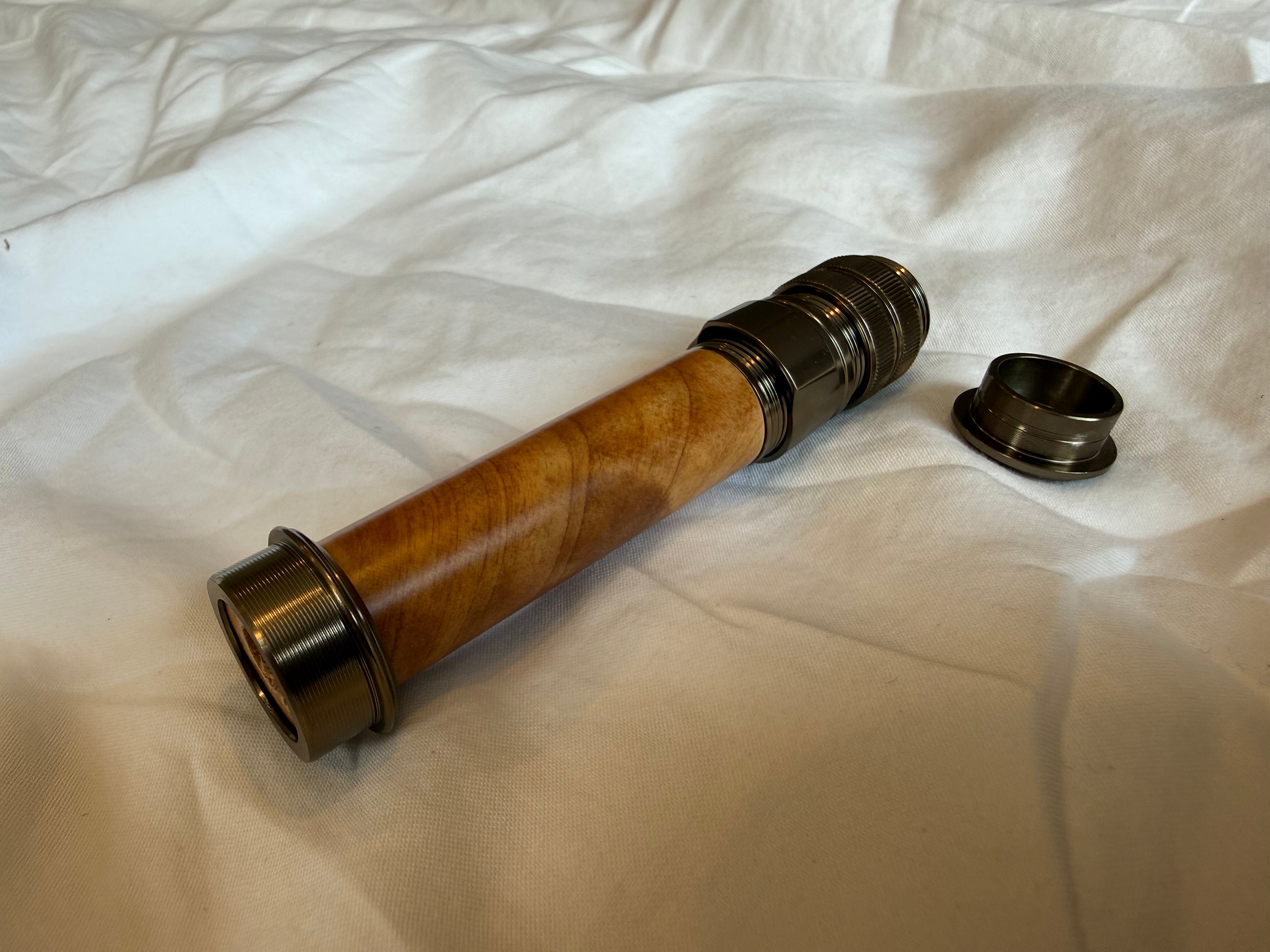 Light weight uplocking fly reel seat with burl wood insert